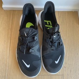 Worn once Nike 10.5 men’s running shoes. Perfect condition